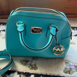Michael Kors powder, blue bag